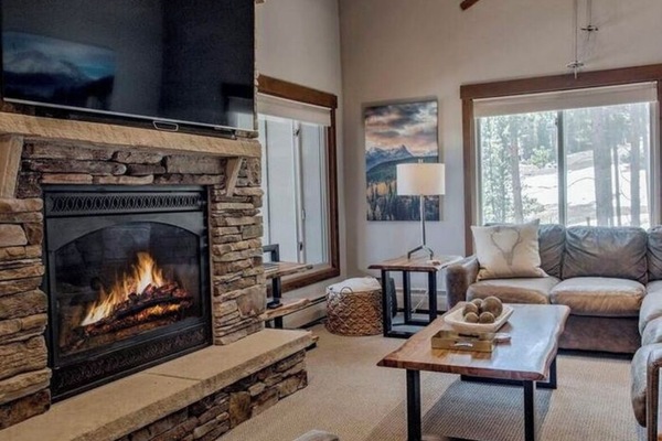 Living room with gas fireplace and Smart TV