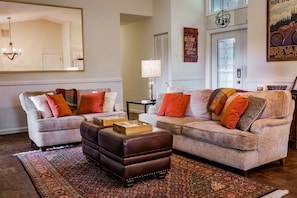 Smart TV, fireplace, books, printers