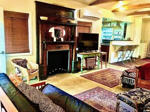 Smart TV, fireplace, DVD player, books