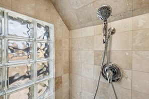 Shower, hair dryer, towels, shampoo