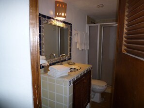Shower, hair dryer, towels, soap