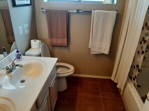 Hair dryer, towels, soap, toilet paper