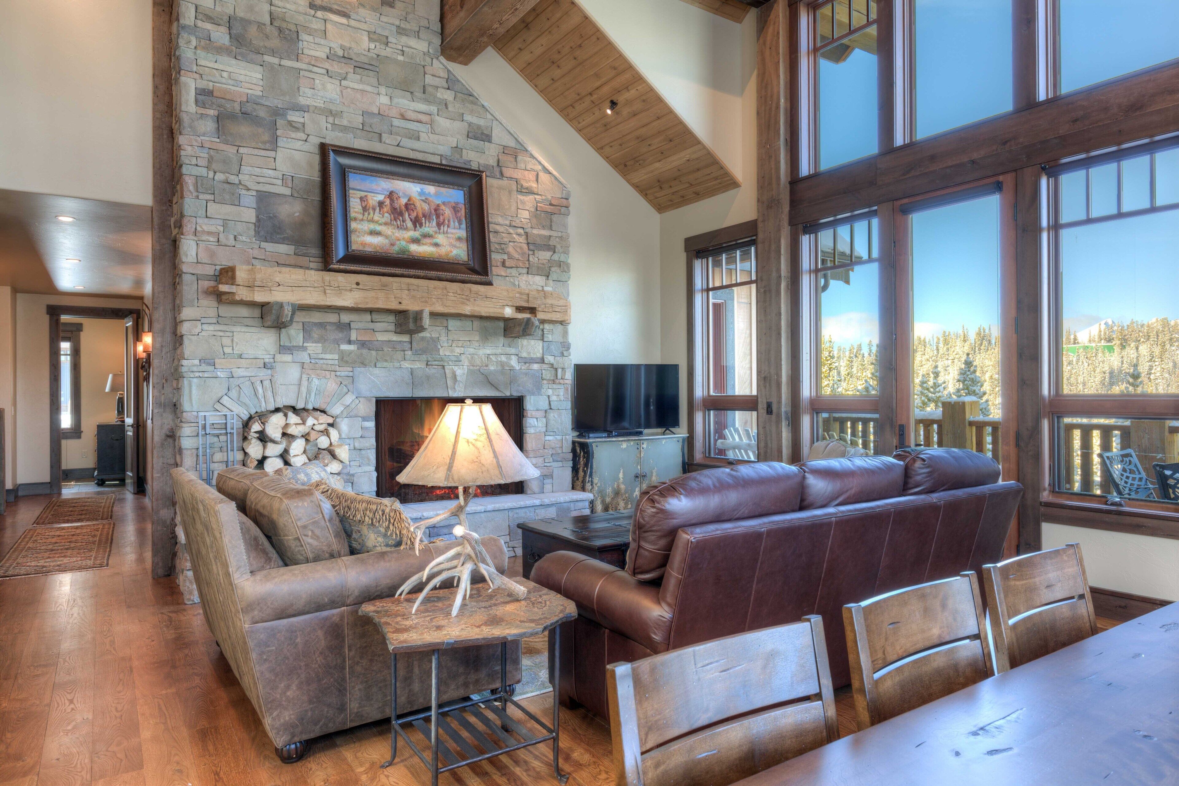 The Great Room stays cozy with a fireplace and commanding views