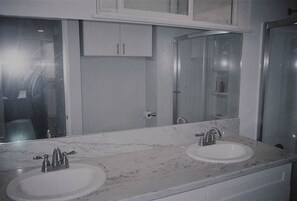 Combined shower/bathtub, hair dryer, towels, soap