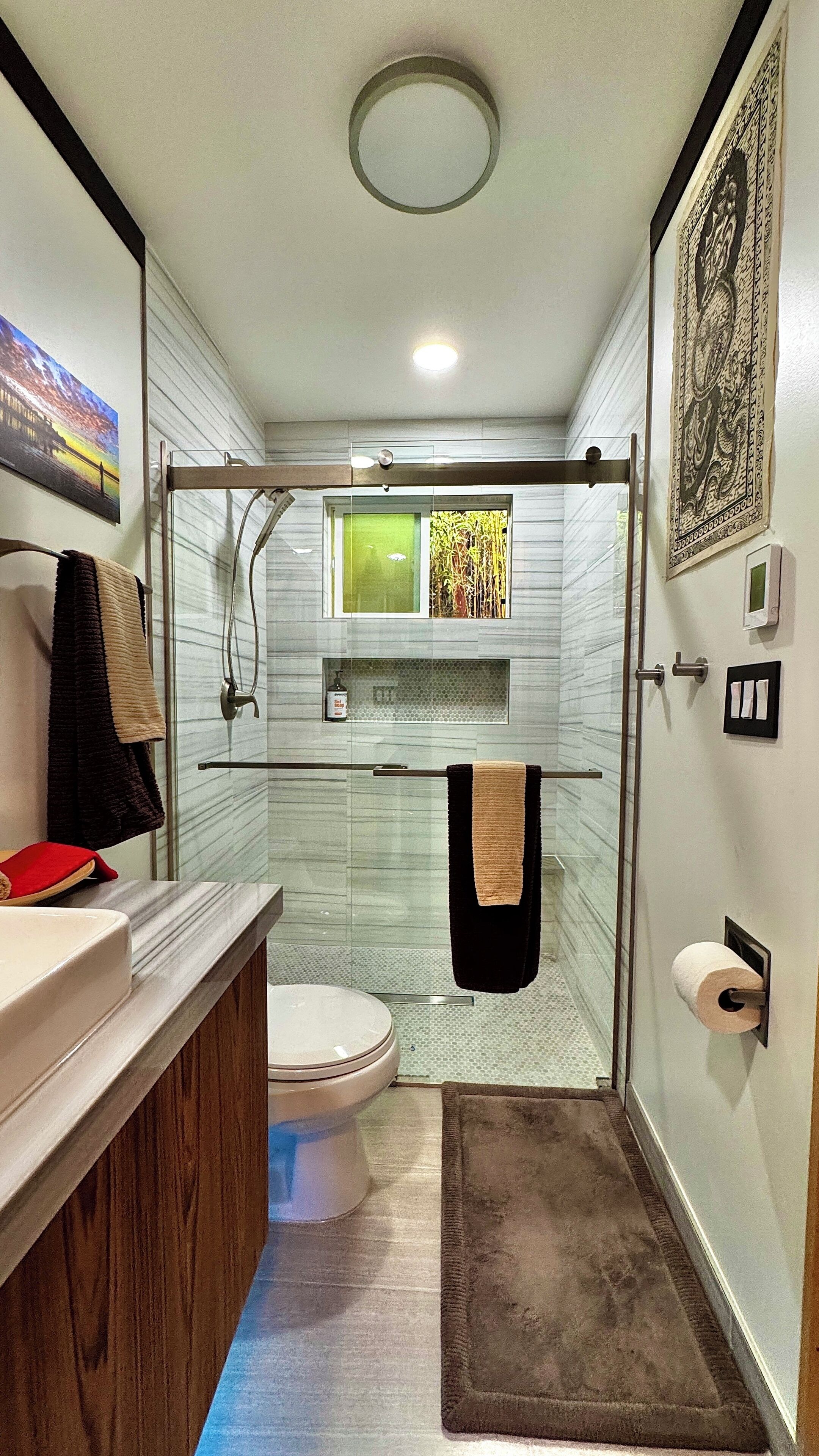 Shower, hair dryer, towels, soap