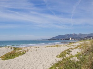 A la platja, gandules de platja i tovalloles de platja 
