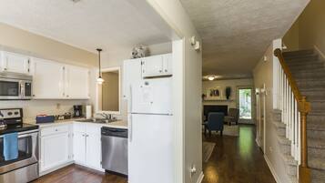 Microwave, dishwasher, coffee/tea maker, cookware/dishes/utensils