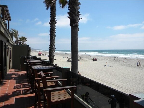 On the beach, sun-loungers, beach towels