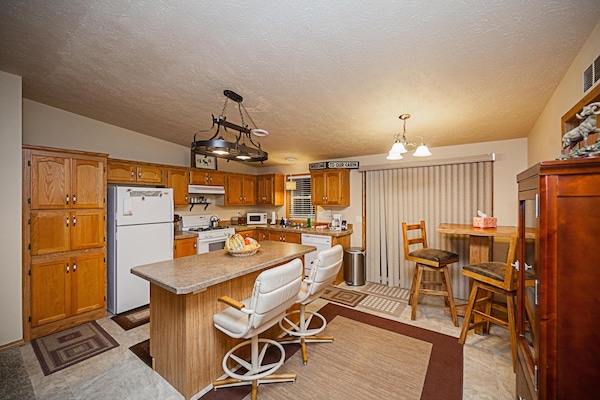 The kitchen is fully functional and stocked with pots, pans and what you need.