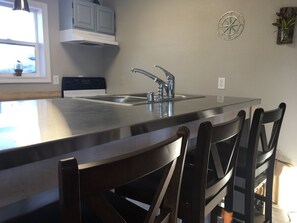 Fridge, microwave, oven, stovetop - Narrow Road Townhouse (Soldotna)