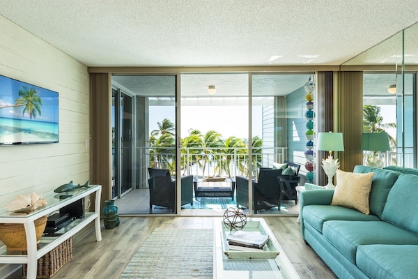 Spacious open style living room with ocean view.