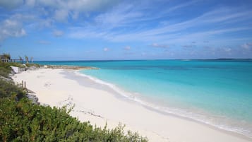 On the beach, sun loungers, beach towels