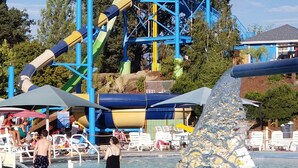 A water park with a large water slide and a pool area. - Suite 16th - Old time charm, Free WiFi, Cable, Downtown (Paso Robles)