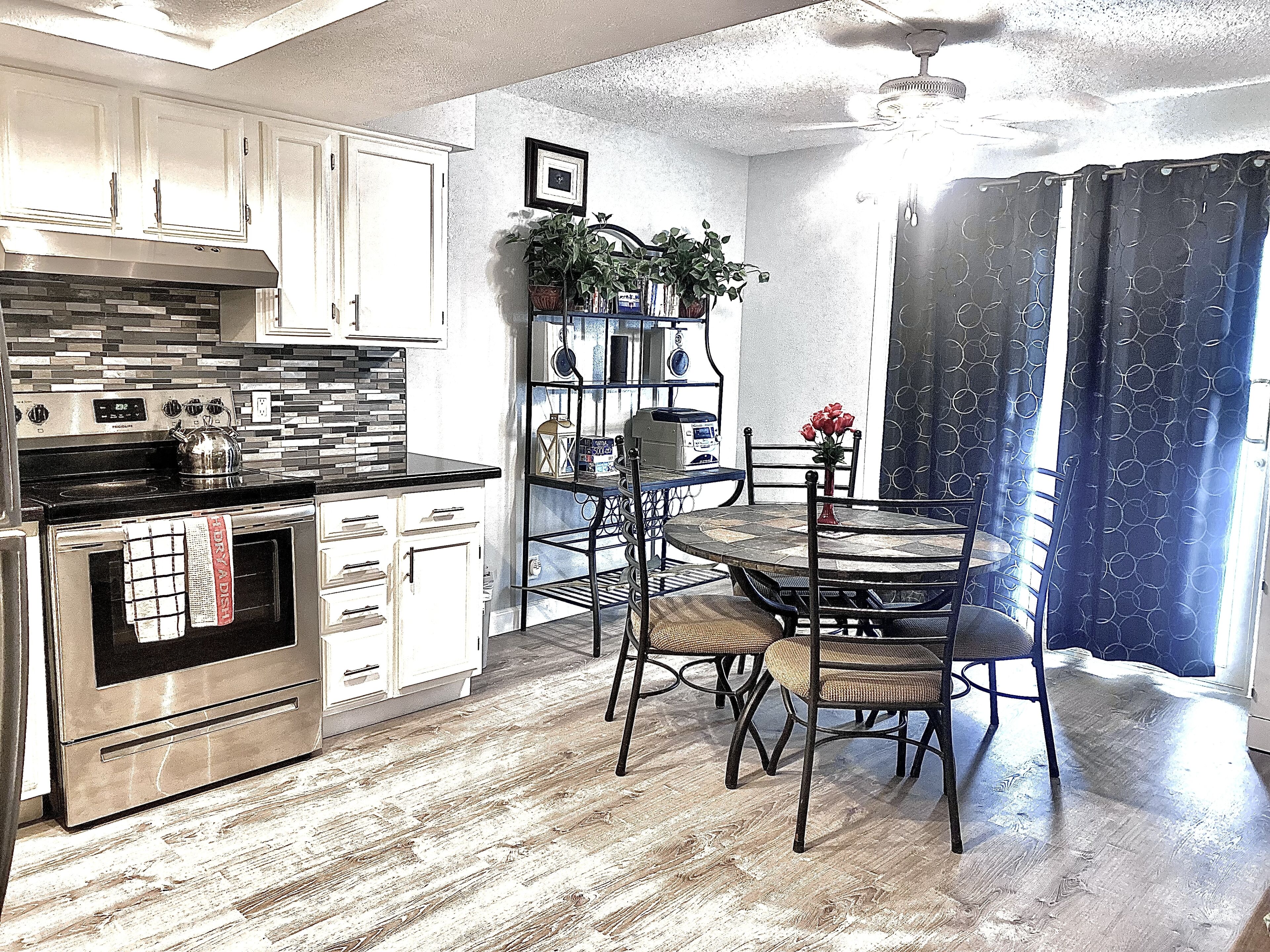 Coffee/tea maker, fridge, microwave, oven