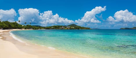 On the beach, sun-loungers, beach towels
