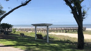 A park with a gazebo, benches, and a boardwalk leading to a beach. - WALK TO THE BEACH!!  First floor condo, fully renovated (Hilton Head Island)