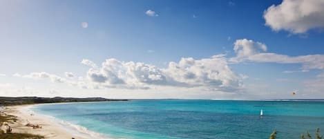 On the beach, sun loungers, beach towels