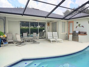 Outdoor pool, a heated pool - Kid Friendly Home W/Pool  in Gated Community,10 Min. to Disney (Kissimmee)