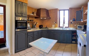 Fridge, microwave, oven, stovetop - Stone Farmhouse In Central France with all year indoor heated pool (Gouttières)