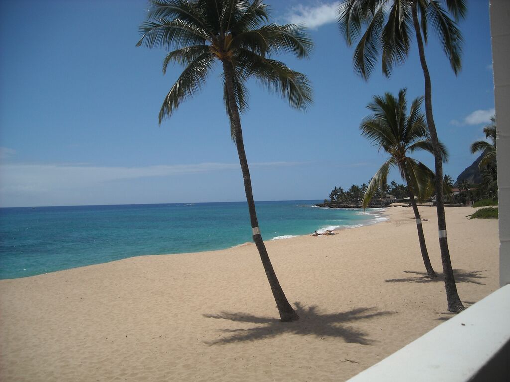 On the beach, sun loungers, beach towels