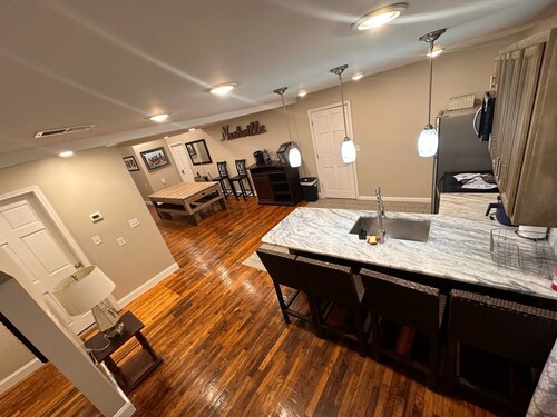 Charming 5BR 5BA home with driveway and yard near downtown!