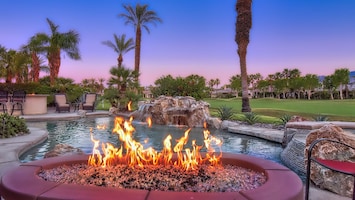 Enjoy your favorite beverage next to the custom firepit with golf course views!