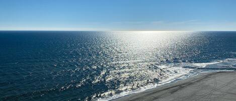 On the beach, sun loungers