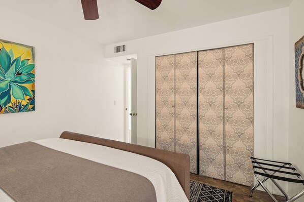 1 bedroom, desk, iron/ironing board, travel crib