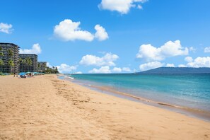 On the beach, sun-loungers, beach towels
