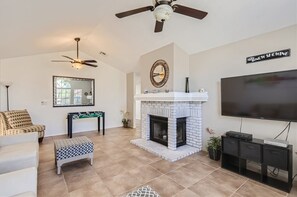 Smart TV, fireplace, DVD player, foosball