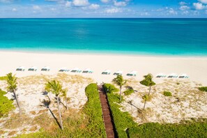 On the beach, sun-loungers, beach towels