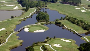 A golf course with multiple bunkers, water hazards, and a bridge. - On Sunset Beach Island 1 Bedroom Condo sleeps 4 Water view! Unit 2 (Sunset Beach)