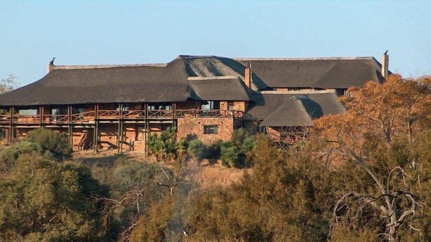 A large, multi-story building with a flat roof and a balcony. - Glen Afric Country Lodge (Broederstroom)
