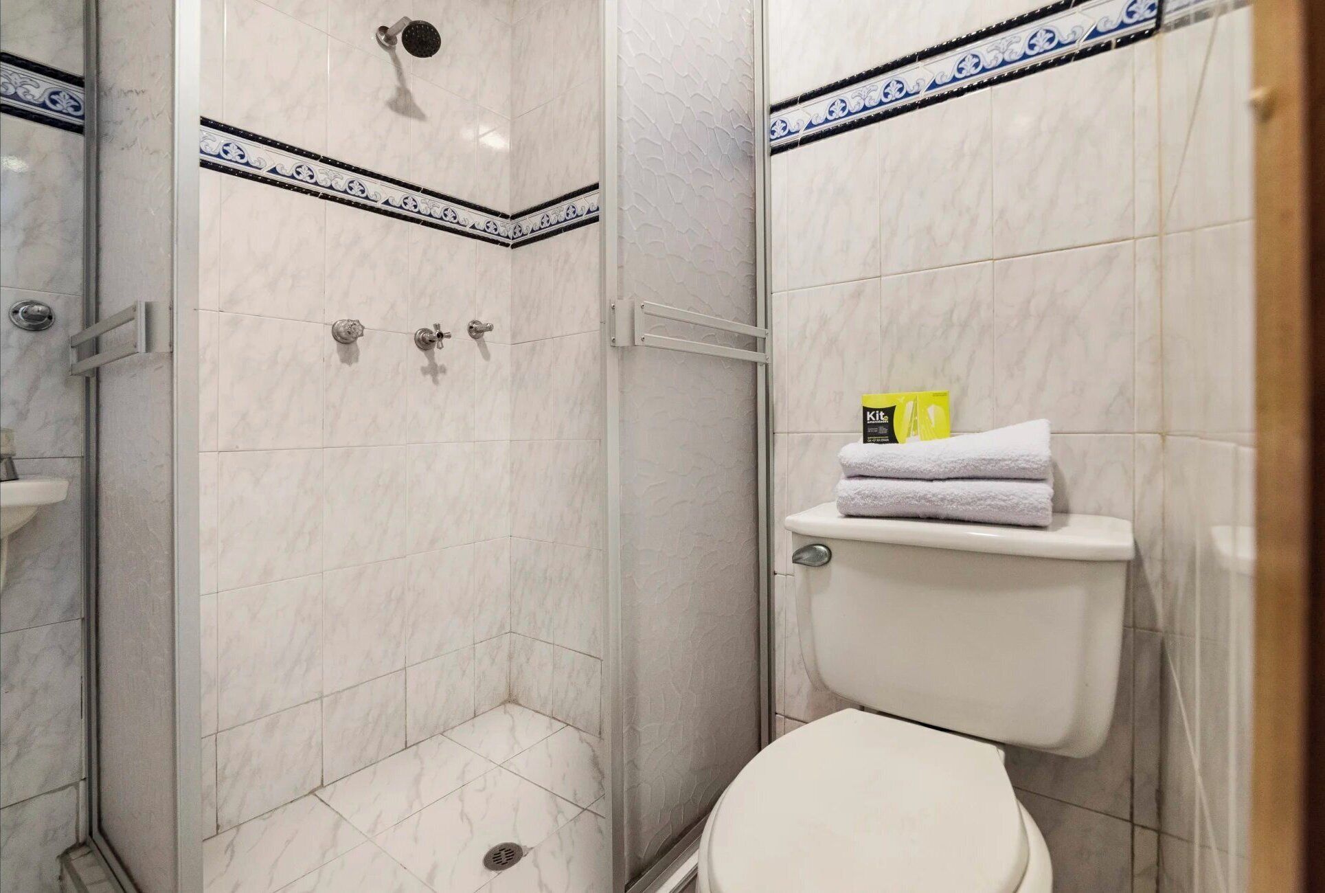 economy twin room | bathroom | shower, free toiletries, towels