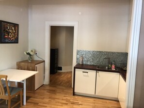 Fridge, microwave, stovetop, coffee/tea maker