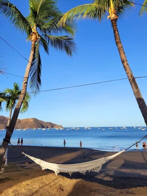 On the beach, beach towels