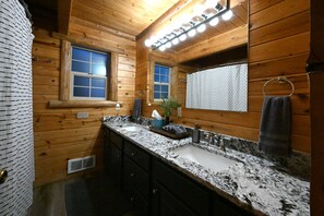 Combined shower/tub, hair dryer, towels, toilet paper