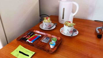 Bungalow, Terrace | Private kitchen | Fridge, microwave, coffee/tea maker