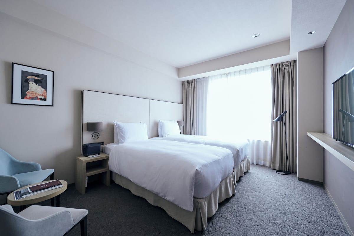Premium bedding, down duvets, in-room safe, individually furnished