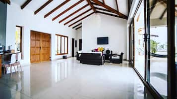 House, 4 Bedrooms | Living area | Flat-screen TV