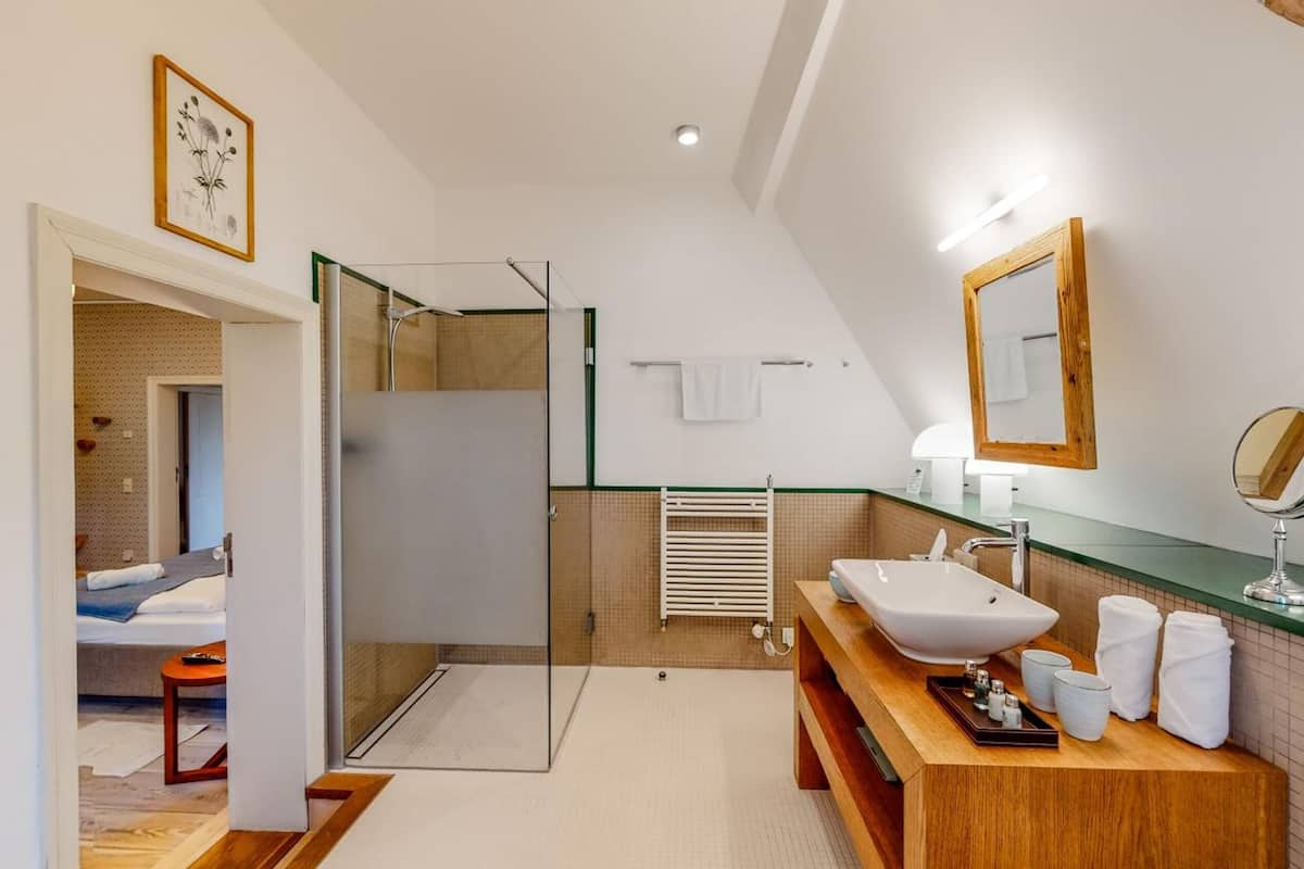 designer toiletries, hair dryer, dressing gowns, slippers
