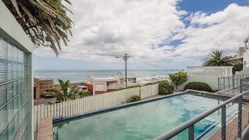 Outdoor pool, pool umbrellas, pool loungers