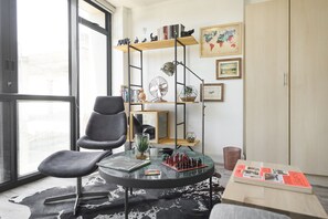 Design Studio Suite, 1 Bedroom | Living room | Flat-screen TV - Four Seasons Suite 2 (Cape Town)