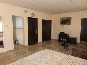 Desk, bed sheets - Ivory Suites (Abuja)