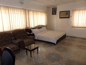 Desk, bed sheets - Ivory Suites (Abuja)