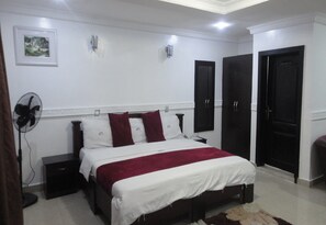 Desk, laptop workspace, free WiFi, bed sheets