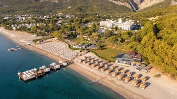 Private beach, sun loungers, beach umbrellas, beach yoga