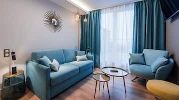 Suite, 1 trÚs grand lit et 1 canapé-lit | Literie de qualité supérieure, coffres-forts dans les chambres