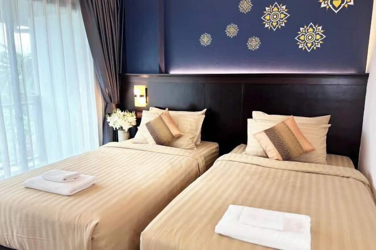 Desk, blackout curtains, free WiFi, bed sheets