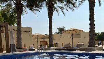2 outdoor pools, pool umbrellas, pool loungers